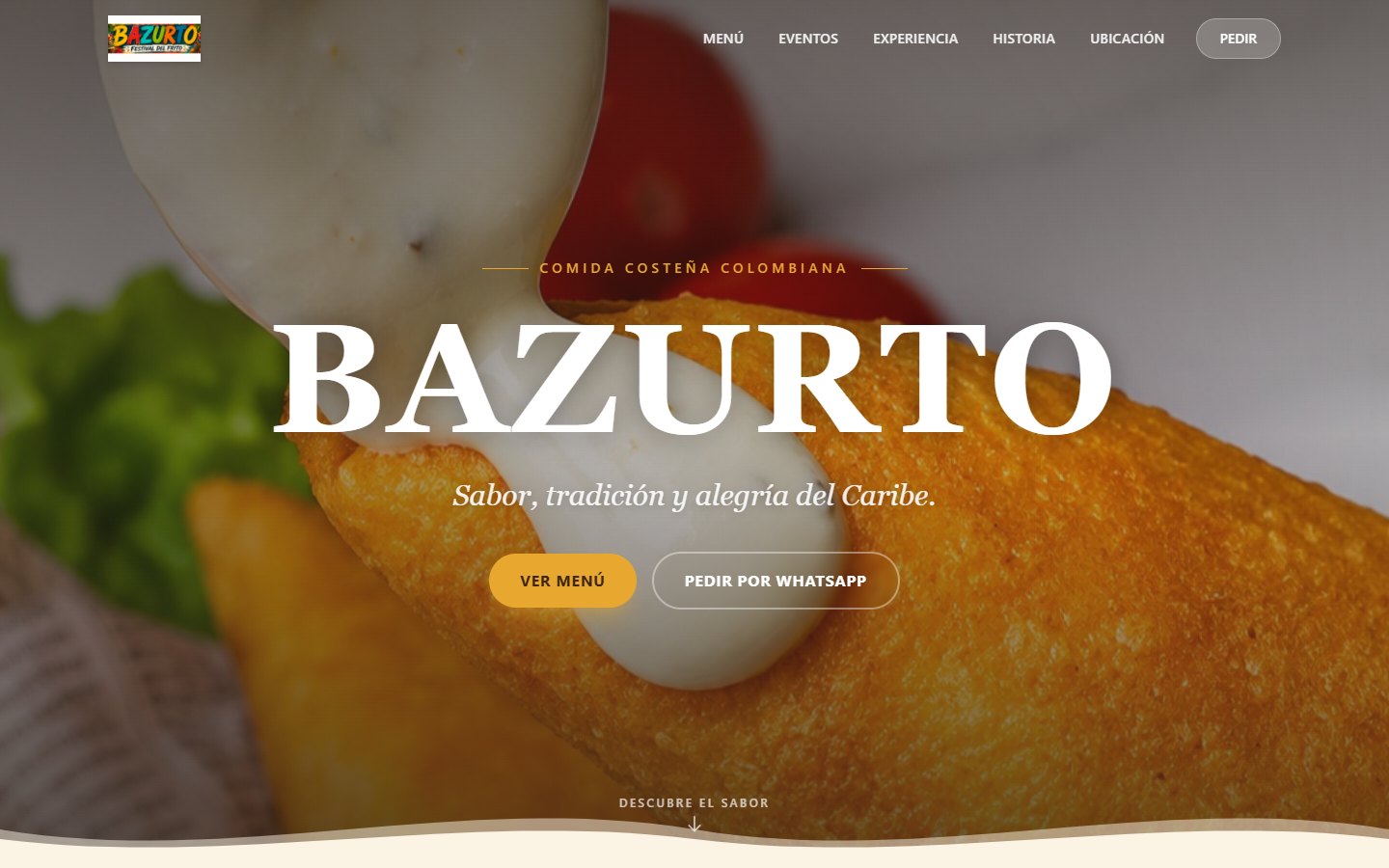 Portada de bazurtopitalito.com: el nombre Bazurto sobre una carimañola con suero, con botones Ver menú y Pedir por WhatsApp.